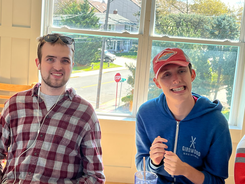 Two people with special needs at an iStrive Community event.