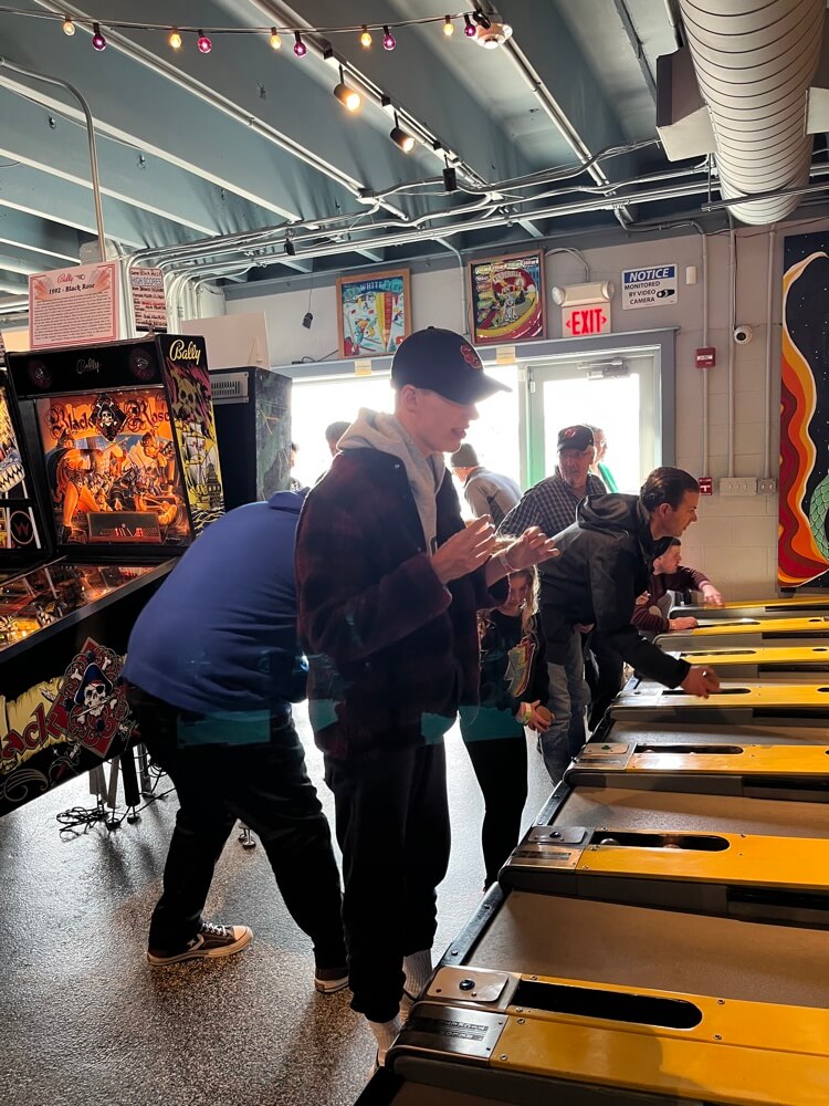 People with special needs at the iStrive Community's "Silverball Arcade" event.