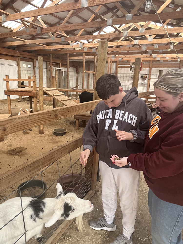 People with special needs at the iStrive Community's "Allaire Community Farm" event.