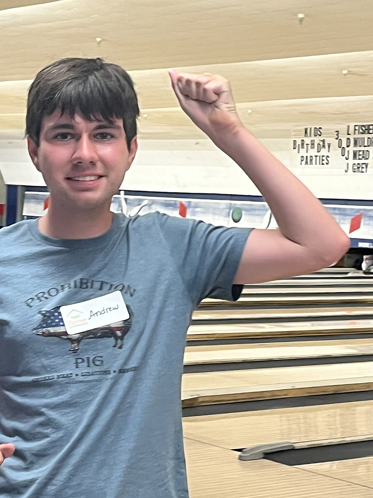 People with special needs at the iStrive Community's "Friday Night Bowling and Pizza" event.