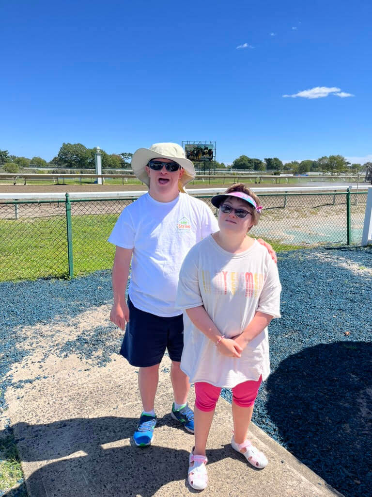 People with special needs at the iStrive Community's "racetrack" event.