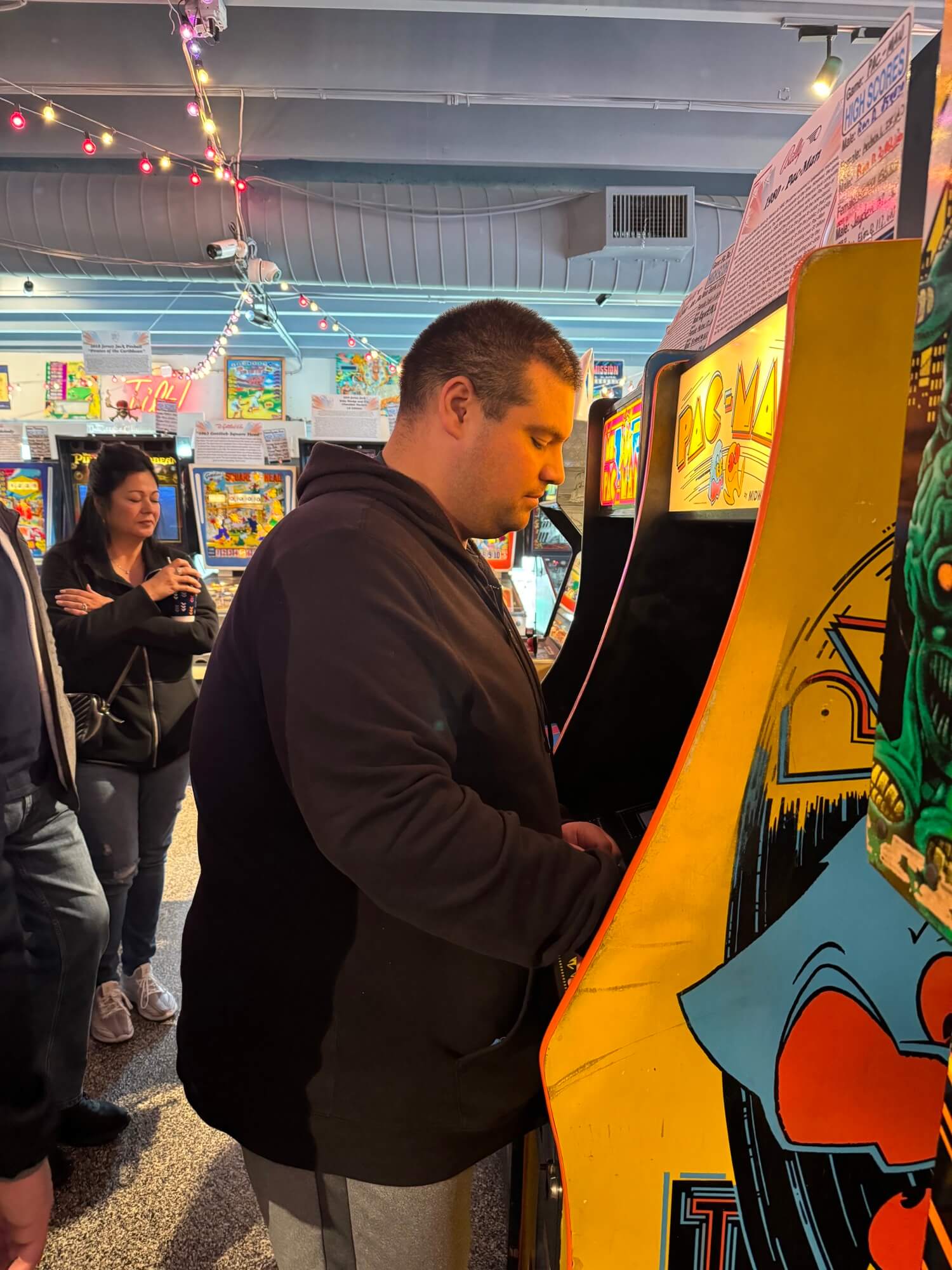 People with special needs at the iStrive Community's "Havin' a Ball at Silver Ball Arcade" event.