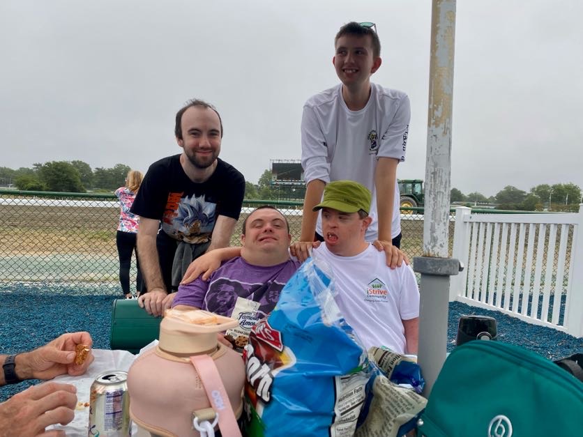 People with special needs at the iStrive Community's "Monmouth Race Track" event.
