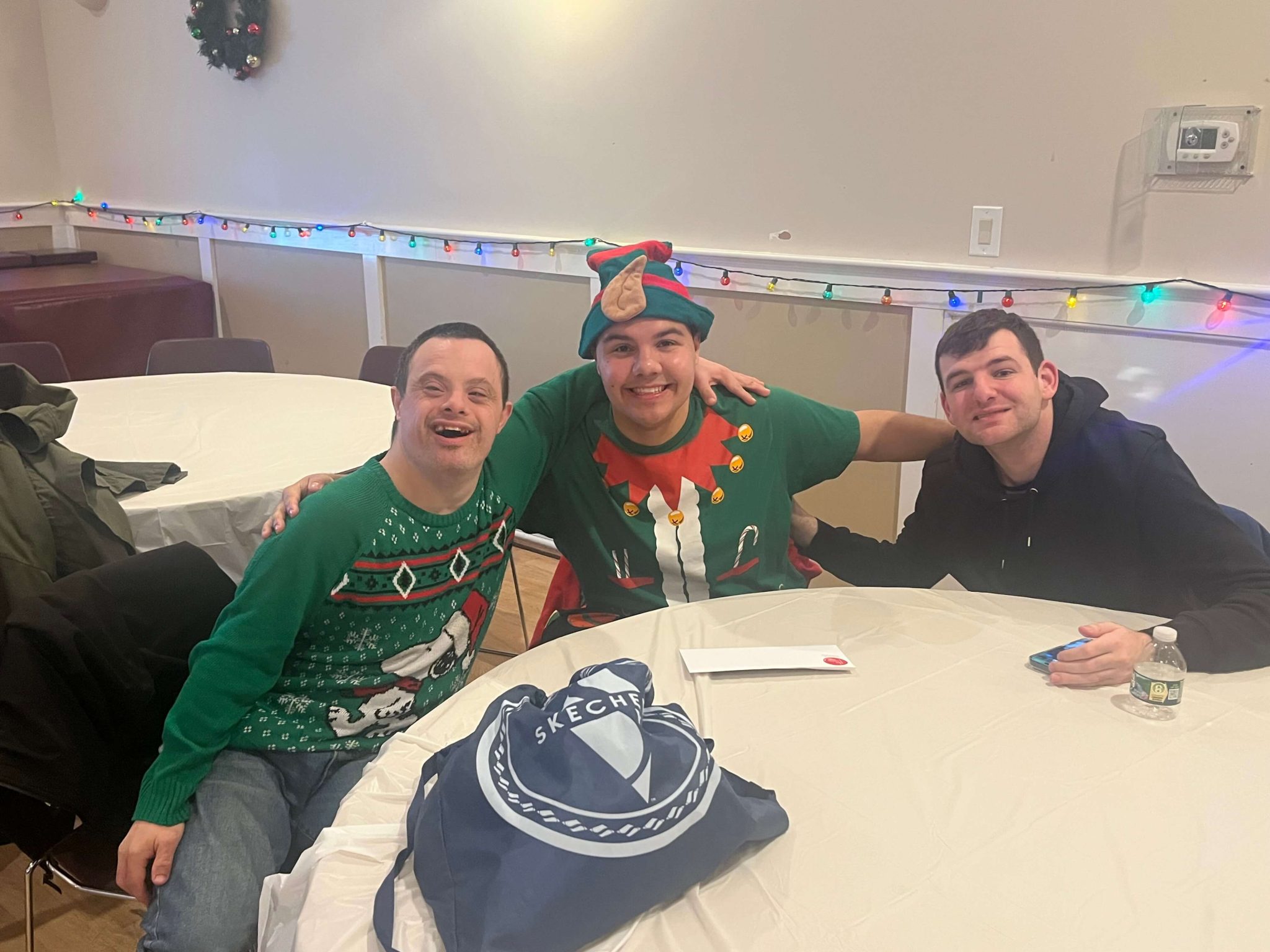 People with special needs at the iStrive Community's "Ugly Sweater Event."