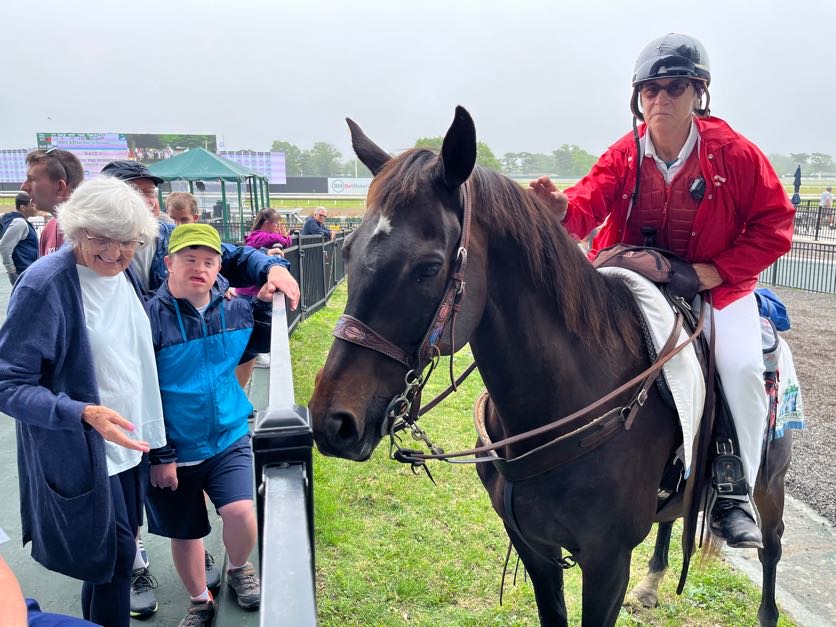 People with special needs at the iStrive Community's "Monmouth Race Track" event.