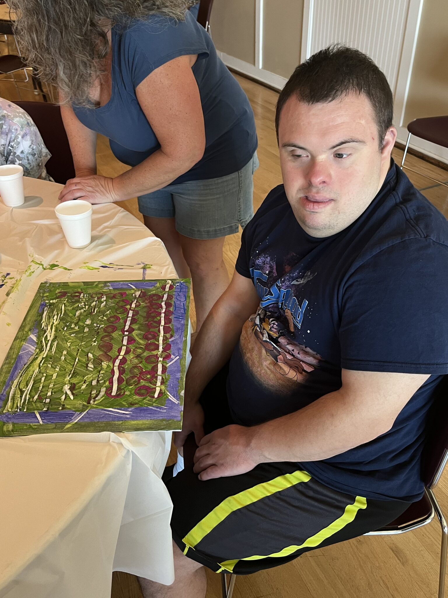 People with special needs & their artwork from the iStrive Community's "Art Event".