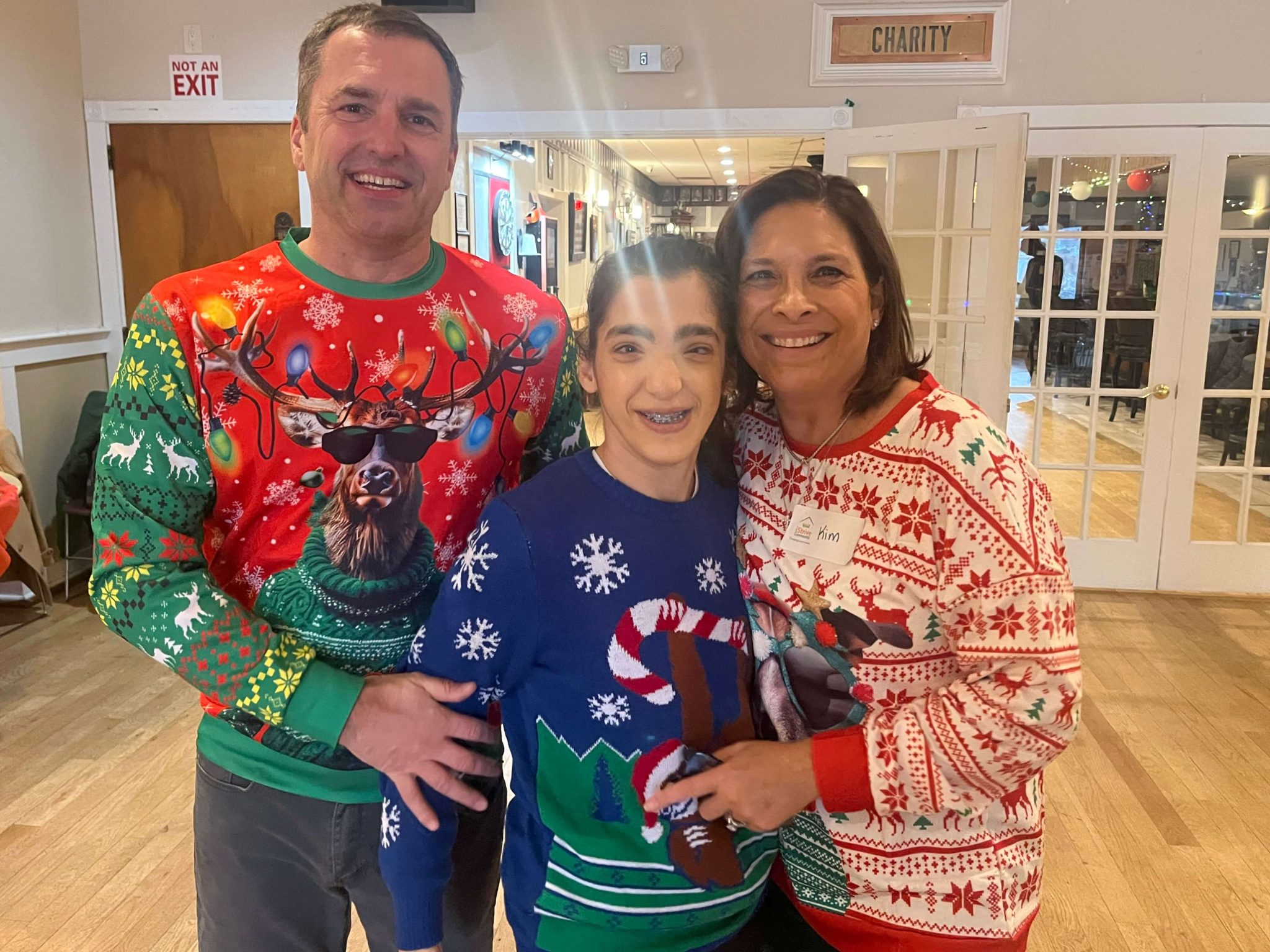 People with special needs at the iStrive Community's "Ugly Sweater Event."