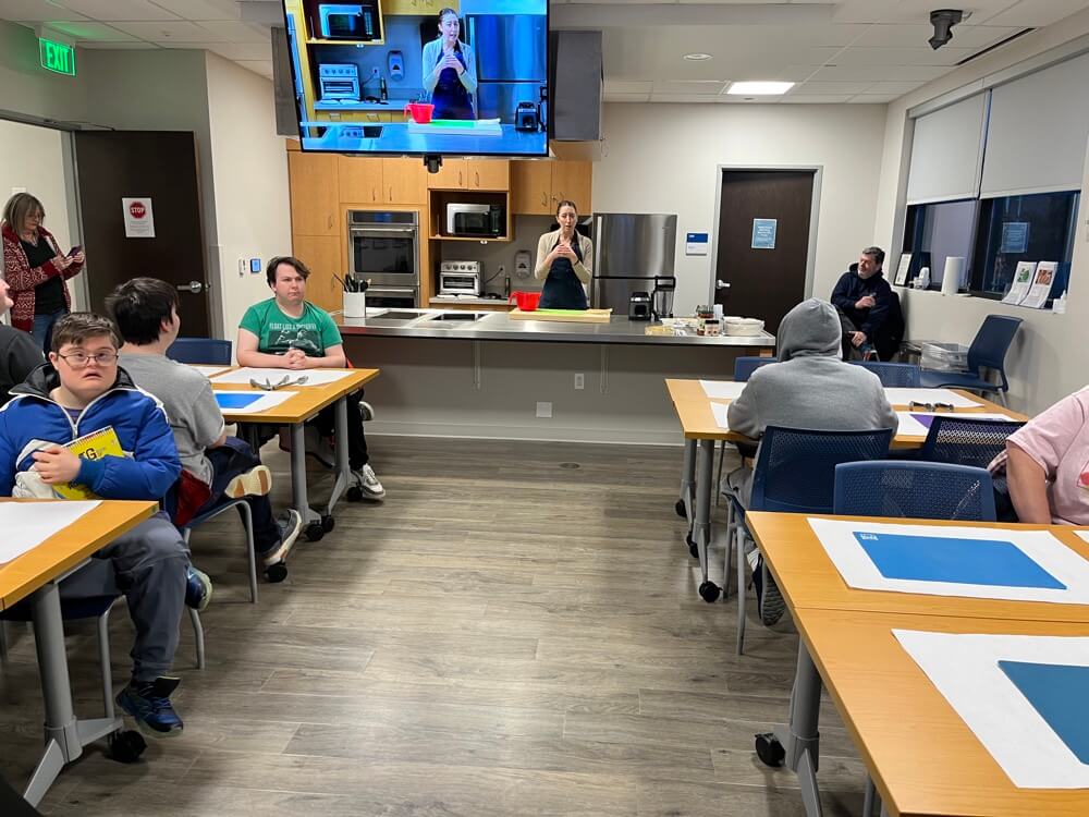 People with special needs at the iStrive Community's "Healthy Eating" event.