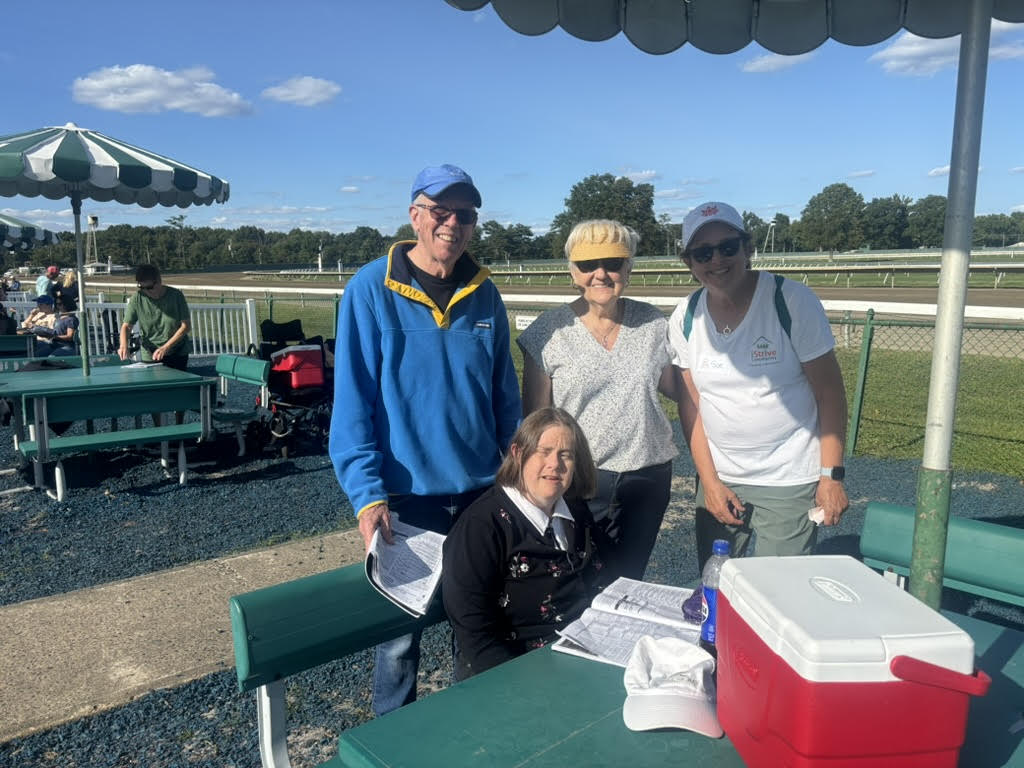 People with special needs at the iStrive Community's "racetrack" event.