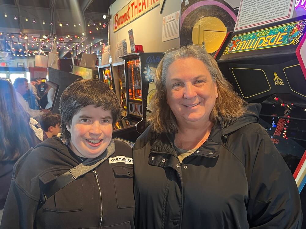 People with special needs at the iStrive Community's "Silverball Arcade" event.