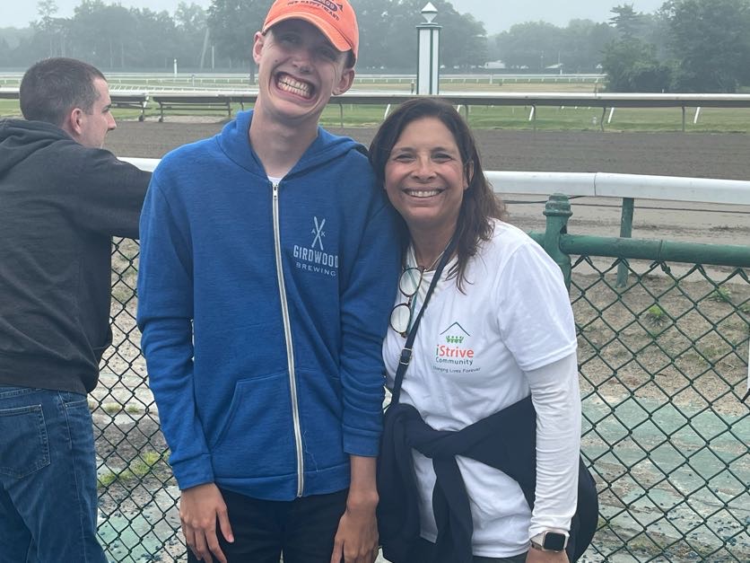 People with special needs at the iStrive Community's "Monmouth Race Track" event.