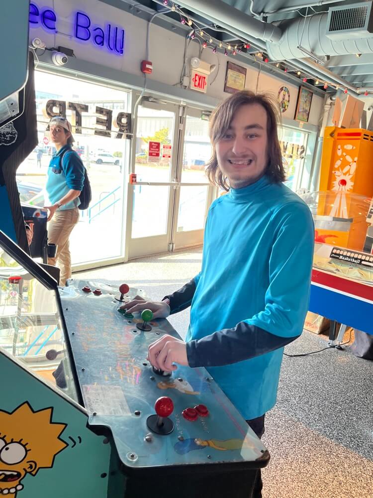 People with special needs at the iStrive Community's "Silverball Arcade" event.