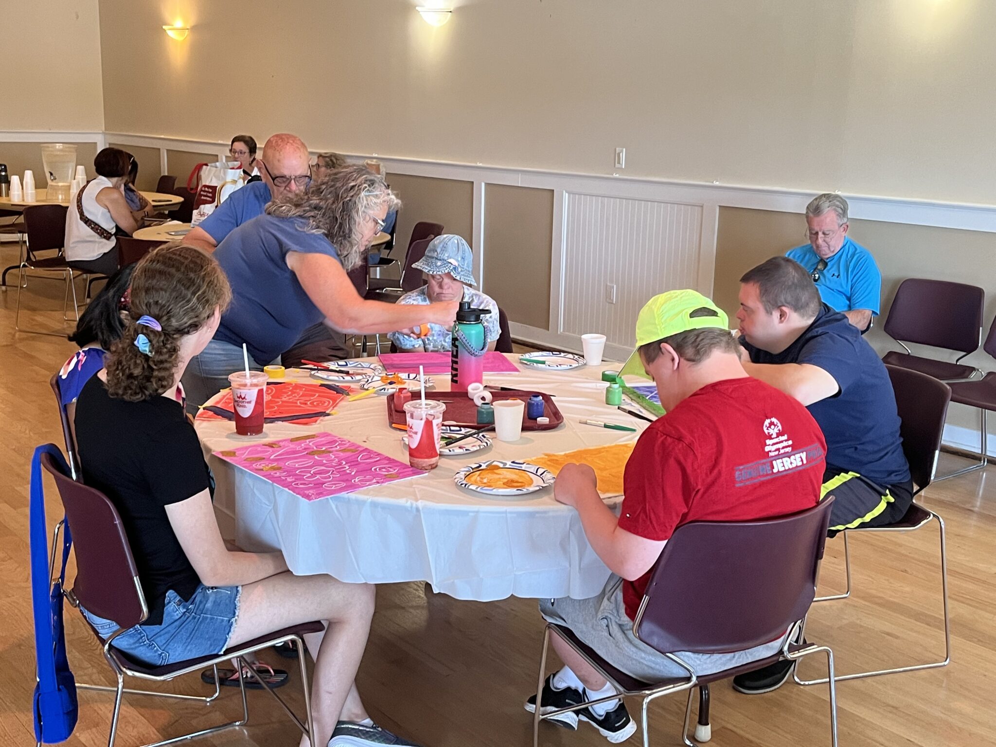 People with special needs & their artwork from the iStrive Community's "Art Event".