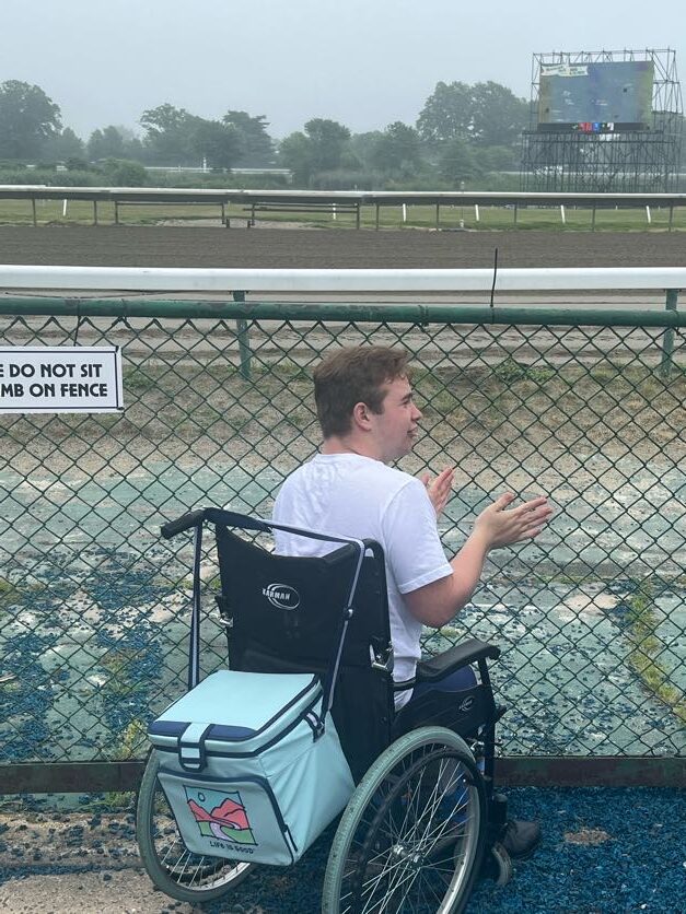 People with special needs at the iStrive Community's "Monmouth Race Track" event.