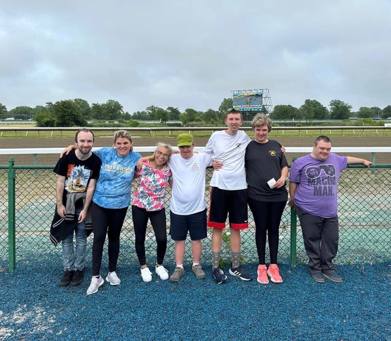 People with special needs at the iStrive Community's "Monmouth Race Track" event.
