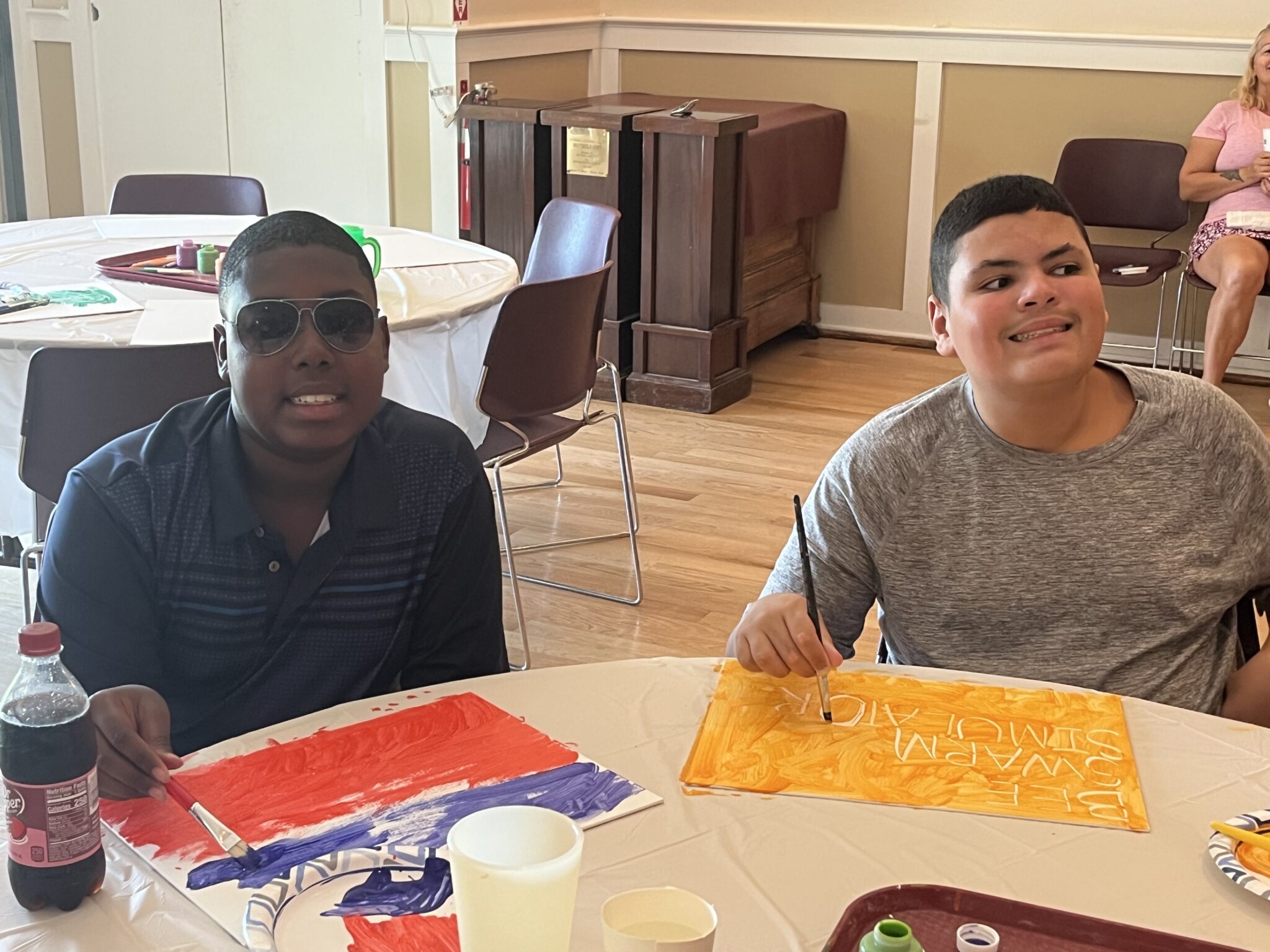 People with special needs & their artwork from the iStrive Community's "Art Event".