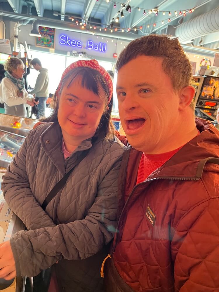 People with special needs at the iStrive Community's "Silverball Arcade" event.