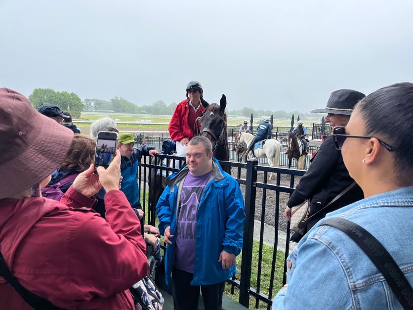 People with special needs at the iStrive Community's "Monmouth Race Track" event.