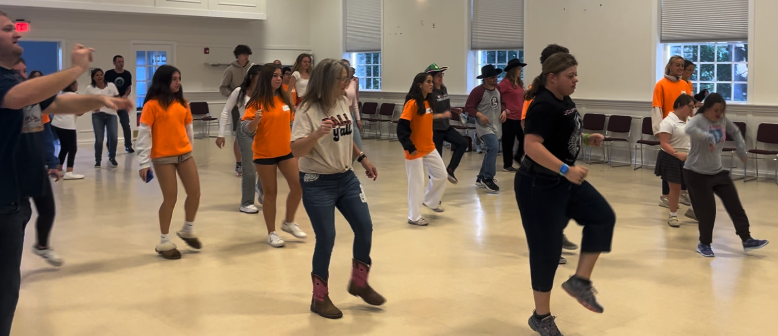 People with special needs at the iStrive Community's "Country Line Dancing" event.